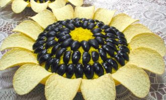 Zonnebloemsalade met frites